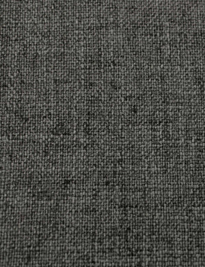 Close-up of the charcoal linen fabric on the Clementine platform bed