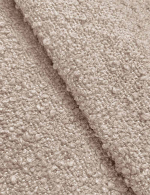 Close-up of the buff boucle fabric on the Clementine platform bed