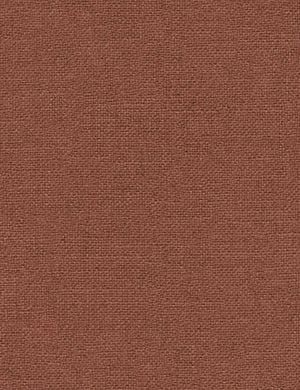 Close-up of the terracotta linen fabric on the Clementine platform bed