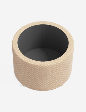 The storage space inside the Kamila Hi-Lo Checker Natural 24-inch ottoman