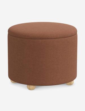 Angled view of the Kamila Terracotta Linen 24-inch ottoman