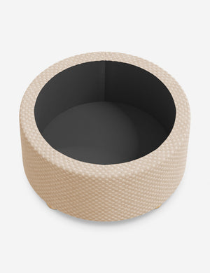 The storage space inside the Kamila Hi-Lo Checker Natural 34-inch ottoman