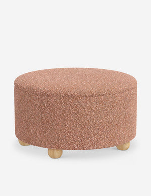 Angled view of the Kamila Blush Boucle 34-inch ottoman