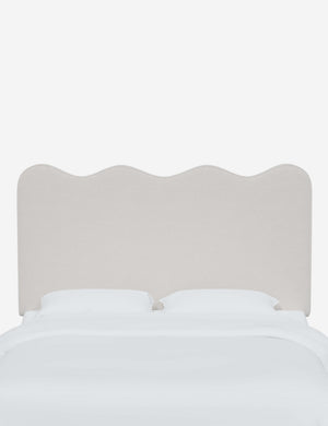Clementine Snow Velvet Headboard with a scalloped shape at the top
