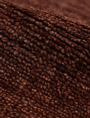 Brick red wool material on the heritage rug