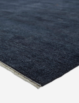Fringed corner of the heritage indigo rug