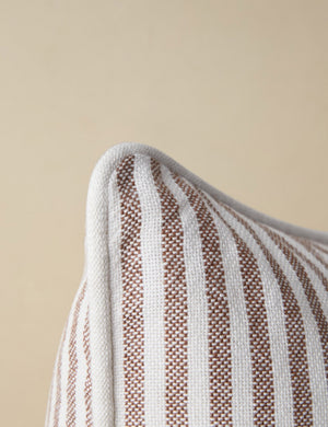Close up of the corner of the Littu Indoor / Outdoor Striped Throw Pillow by Sarah Sherman