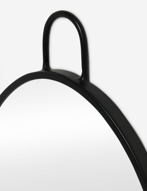 Close up view of the Loop hanging oval wall mirror