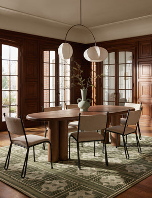 Dining room featuring the Carlisle Geometric Motif Hand-Knotted Wool Rug by Aimee Song