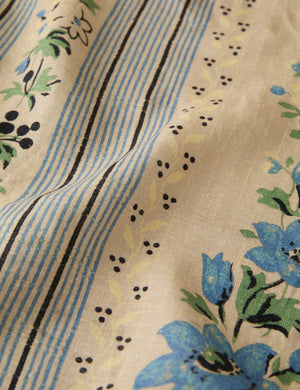 Close up of the pattern of the Golden floral stripe linen tablecloth by Heidi Caillier