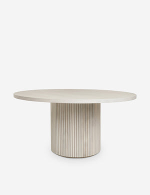 Rutherford white-washed acacia wood round dining table with pedestal base.