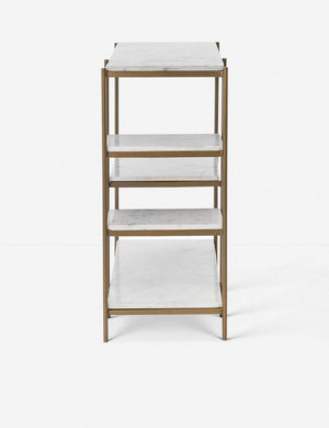 Side view of the Kathleen console table with marble shelves and gold finish