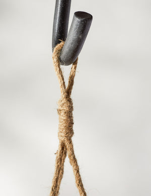 Close-up of the jute strap on the top of the Brandie Hanging Woven Rattan Basket