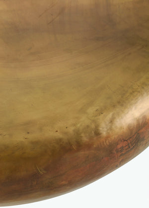 Close-up of the surface of the Arteriors bates round metallic coffee table