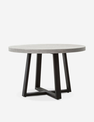 Agatha indoor and outdoor dining table with lavastone top and black iron base