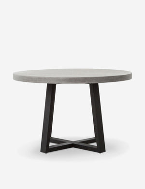 Agatha indoor and outdoor dining table with lavastone top and black iron base