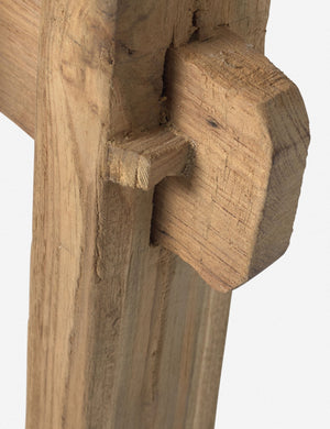 Close-up of the leg detailing on the Arlene craftsman-style antiqued teak wood bench