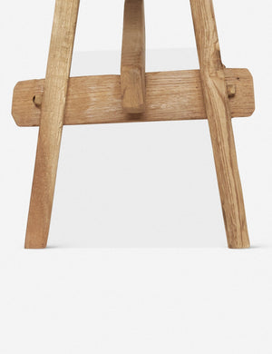 Close-up of the legs of the Arlene craftsman-style antiqued teak wood bench