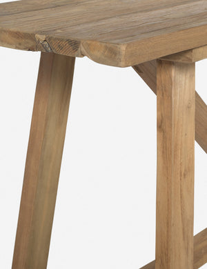 Close-up of the corner of the Arlene craftsman-style antiqued teak wood console table