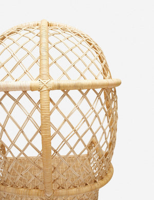 Rear close-up of the upper half of the Charley rattan accent chair with sloping back