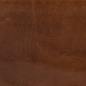 Close-up of the brown leather for the Marlyne accent chair