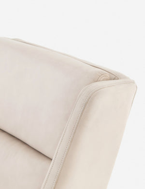 Close-up of the top and the back of the Dove ivory leather accent chair