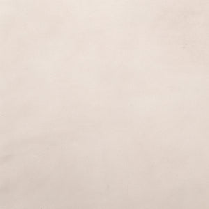 Detailed-shot of the ivory leather on the Dove ivory leather accent chair