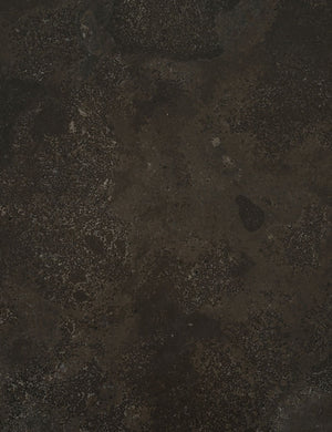 Detailed view of the bluestone on the top of the Ginette bluestone nesting side tables with black metal legs