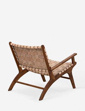 Angled rear view of the Jaslene beige woven leather accent chair