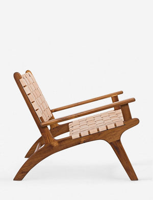 Side view of the Jaslene beige woven leather accent chair
