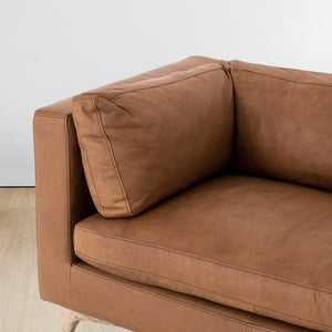 Close-up of the left side of the Jocelyn brown leather sofa