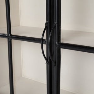 Glass paneled doors with black iron frame and black door handles on the Marjorie black iron sideboard