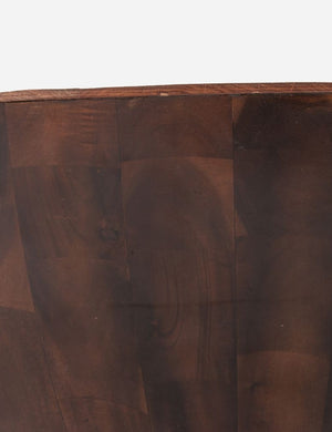 Close-up of the side of the Orseline wooden round coffee table